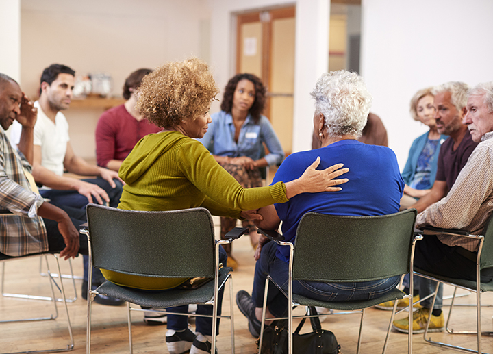 People attending a supportive self-help therapy group